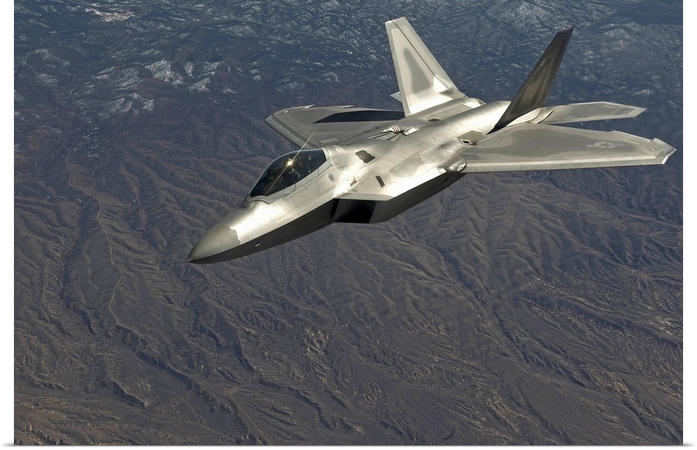 March 2, 2011 - A U.S. Air Force F-22 Raptor flies over the Nevada Test and Training Range for a training mission during R...