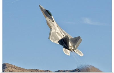 A U.S. Air Force F-22 Raptor takes off from Nellis Air Force Base, Nevada