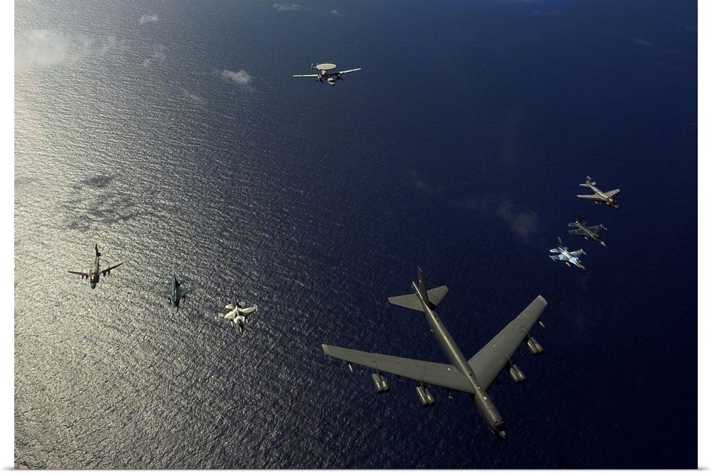 February 15, 2010 - A U.S. Air Force B-52 Stratofortress aircraft leads a formation of two F-16 Fighting Falcon aircraft, ...