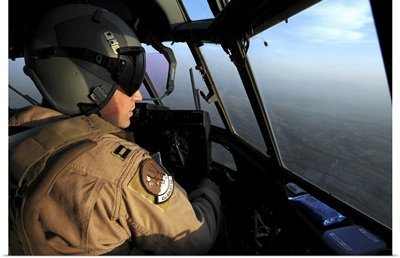 A US Air Force C130J Hercules pilot flies a mission over Afghanistan