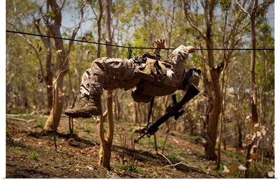 A US Marine Participates In A Gorge Crossing Demonstration