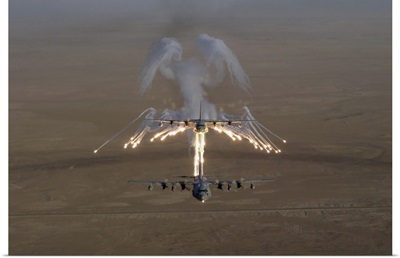 Aerial shot over Iraq of a KC-130 Stratotanker firing flares