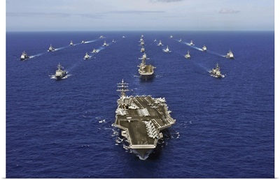 Aircraft carrier USS Ronald Reagan transits the Pacific Ocean with a fleet of ships