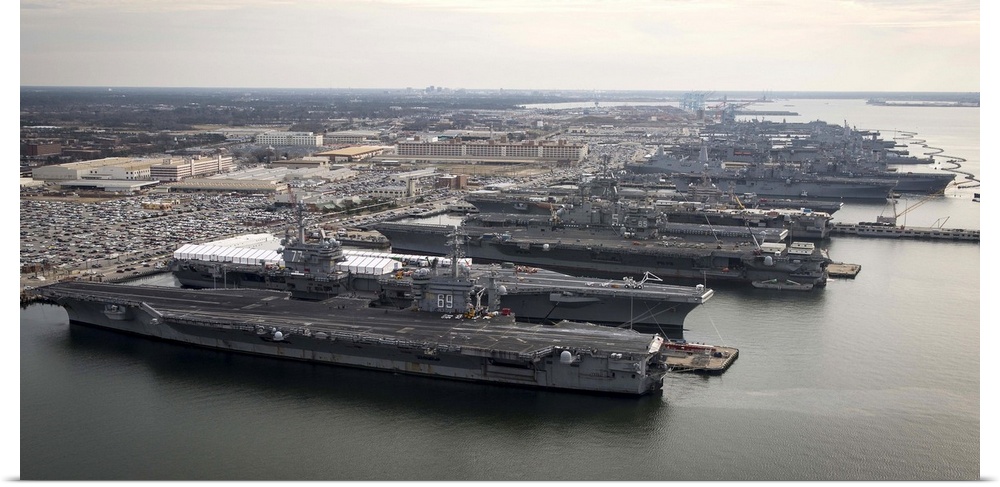 December 20, 2012 - The aircraft carriers USS Dwight D. Eisenhower (CVN 69), USS George H.W. Bush (CVN 77), USS Enterprise...
