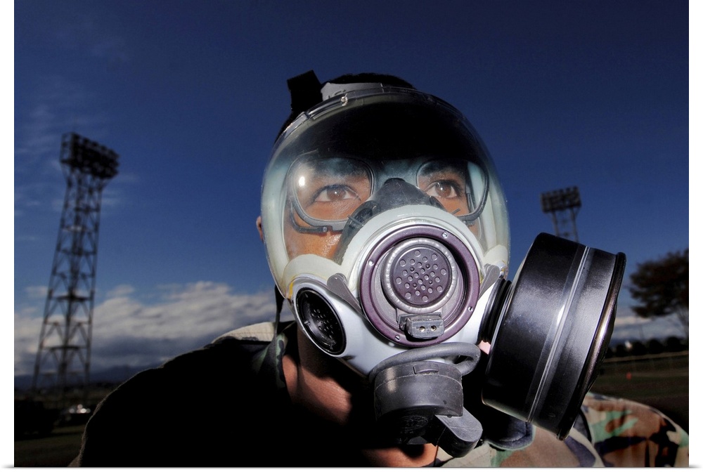 Yokota Air Base, Japan - Airman processes through the contaminated control area during ability to survive and operate trai...