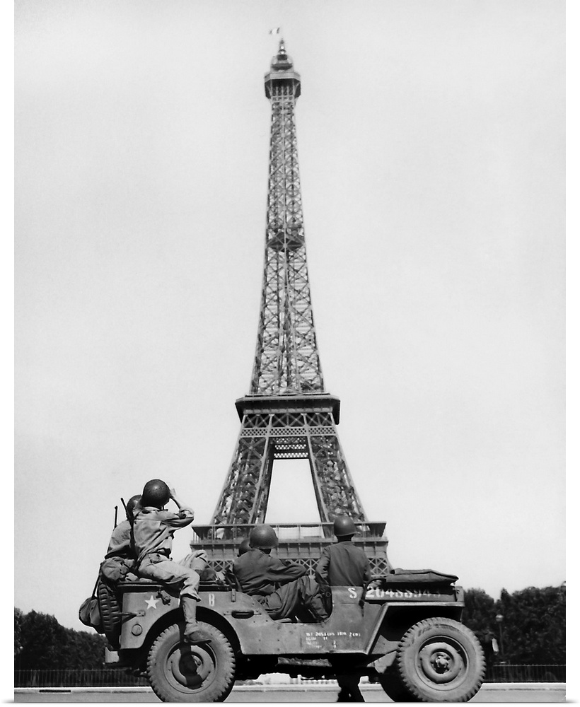 American soldiers viewing The Eiffel Tower after the liberation of Paris France, 1944.