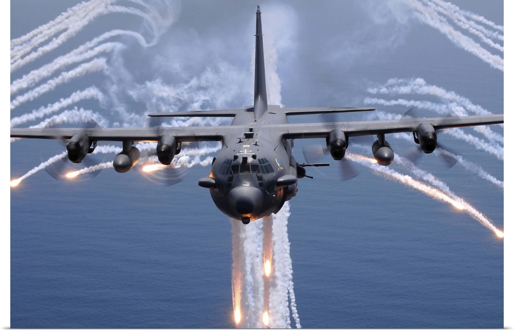 An AC-130H gunship aircraft jettisons flares as an infrared countermeasure.