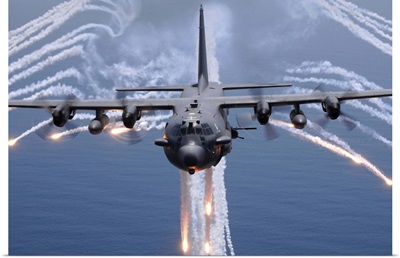An AC-130H gunship aircraft jettisons flares as an infrared countermeasure