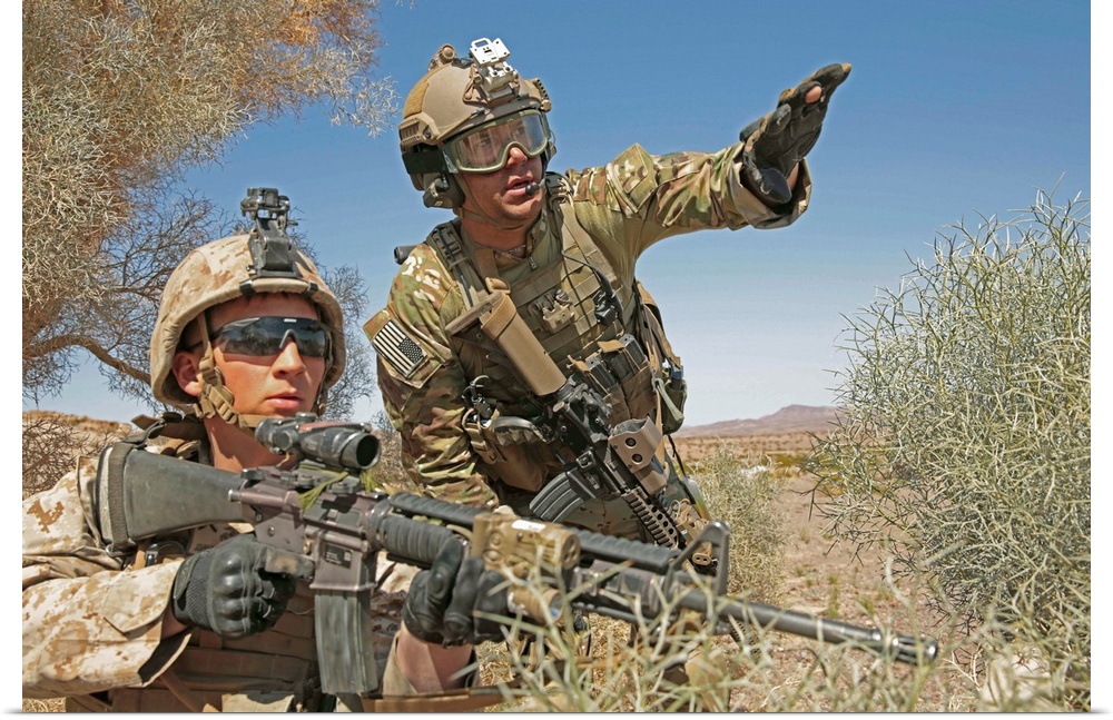 An Army soldier informs a Marine on the current situation while providing security.