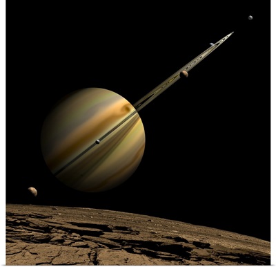 An artist's depiction of a ringed gas giant planet with six moons