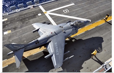 An AV-8B Harrier  prepares to takeoff from USS Peleliu