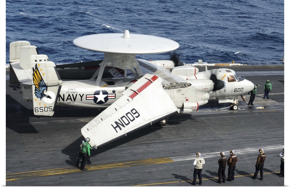 Indian Ocean, June 4, 2013 - An E-2C Hawkeye gets ready for take off from the flight deck aboard the aircraft carrier USS ...