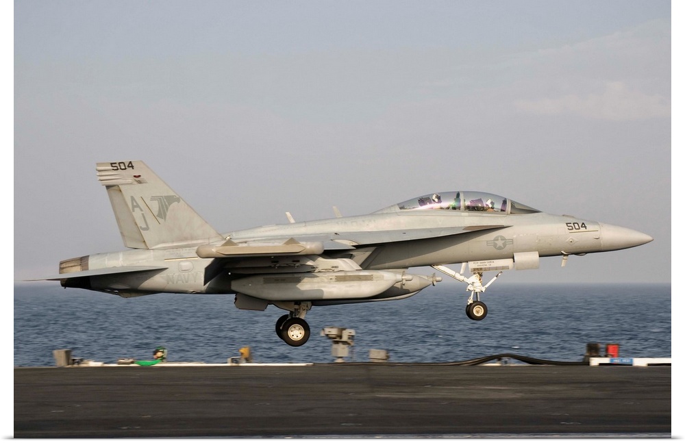Persian Gulf, October 30, 2011 - An EA-18G taking off from the flight deck of USS George H.W. Bush.