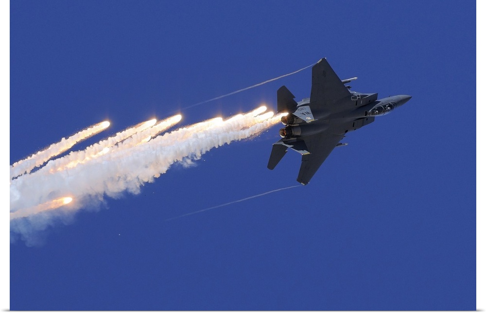November 11, 2012 - An F-15E Strike Eagle releases flares above Nellis Air Force Base, Nevada.
