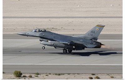 An F-16C Fighting Falcon taking off from Nellis Air Force Base