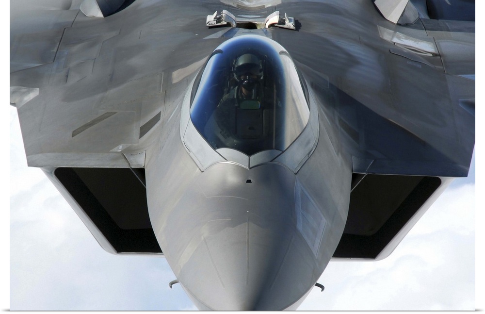 March 31, 2011 - An F-22 Raptor pilot lines up the aircraft to be refueled by a KC-135 Stratotanker.