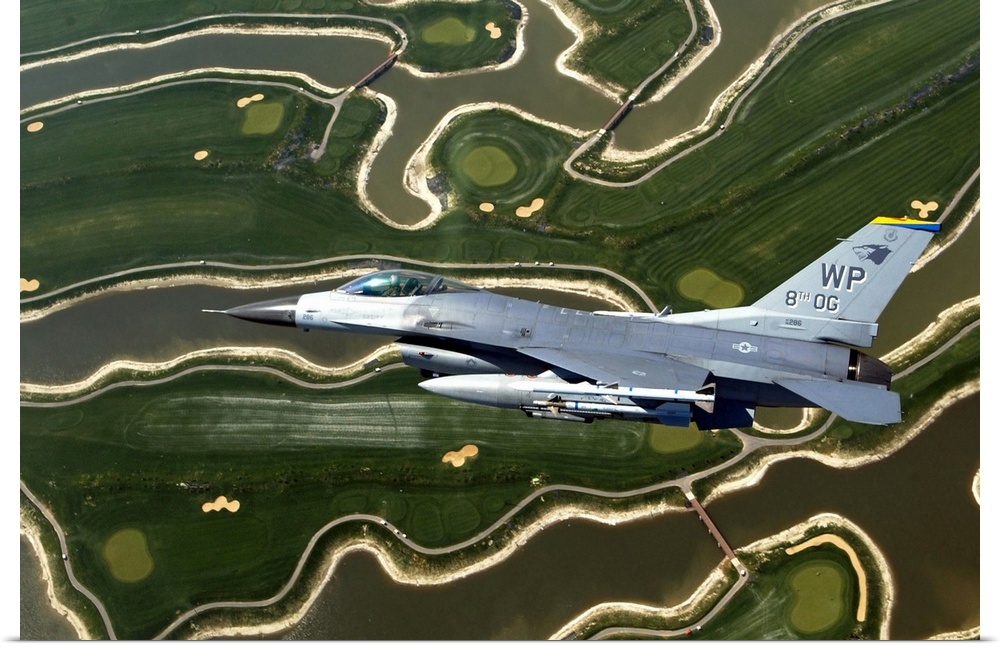 An F16 Fighting Falcon flies near base