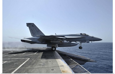 An F/A-18E Super Hornet launches from USS Enterprise