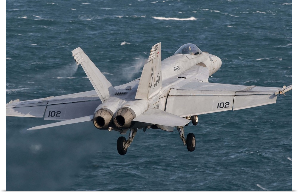 Persian Gulf, October 31, 2011 - An F/A-18E Super Hornet taking off from the flight deck of USS George H.W. Bush.