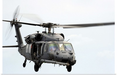 An HH60 Pave Hawk helicopter conducts search and rescue operations