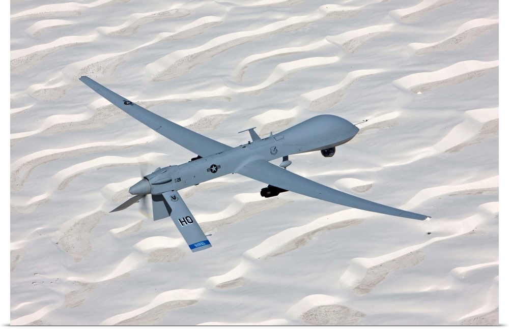An MQ-1 Predator flies a training mission over the White Sands National Monument in Southern New Mexico.