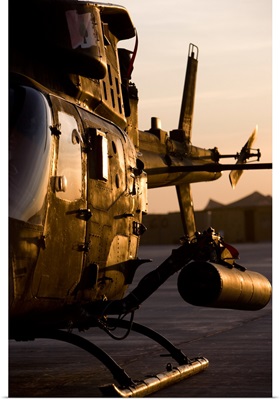 An OH58D Kiowa during sunset