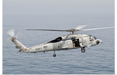 An SH-60F Seahawk gets airborne from the deck of USS Harry S. Truman