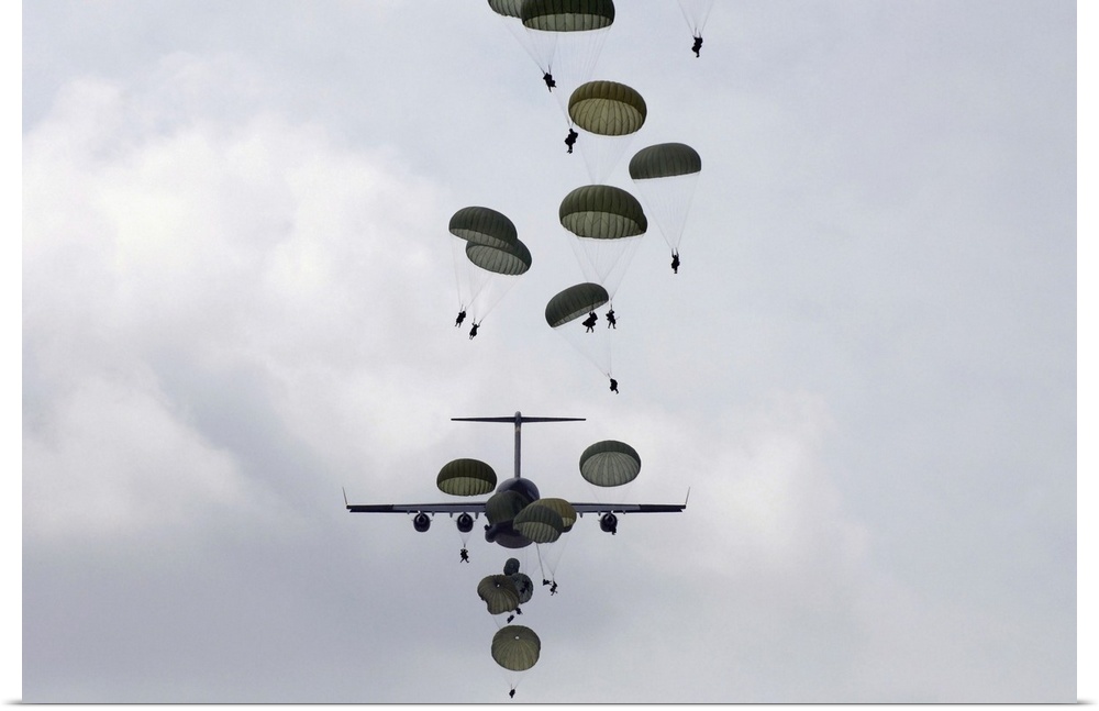 Wall art of soldiers parachuting from planes.