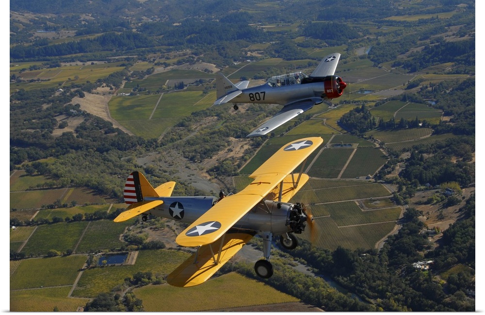 North American AT-6 Texan and Stearman PT-17 flying over Santa Rosa, California.