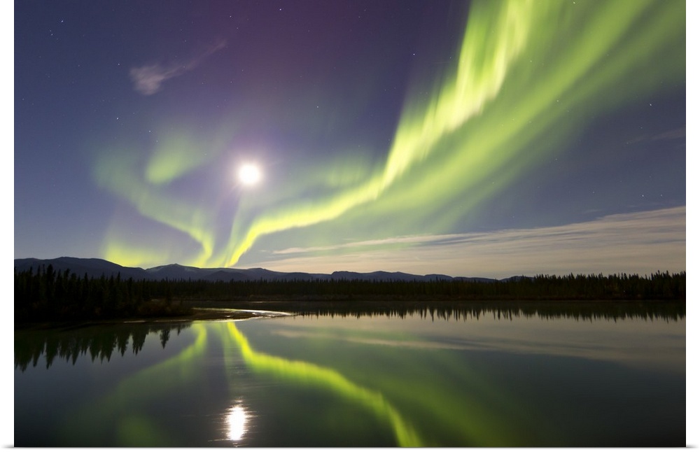 Aurora borealis and Full Moon over the Yukon River, Whitehorse, Yukon, Canada.