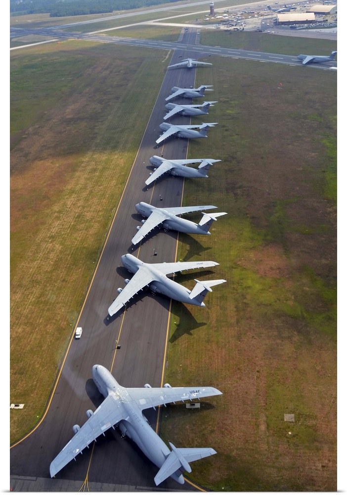 August 4, 2012 - C-5 Galaxies align on the runway to make room for air show aircraft at Westover Air Reserve Base, Massach...