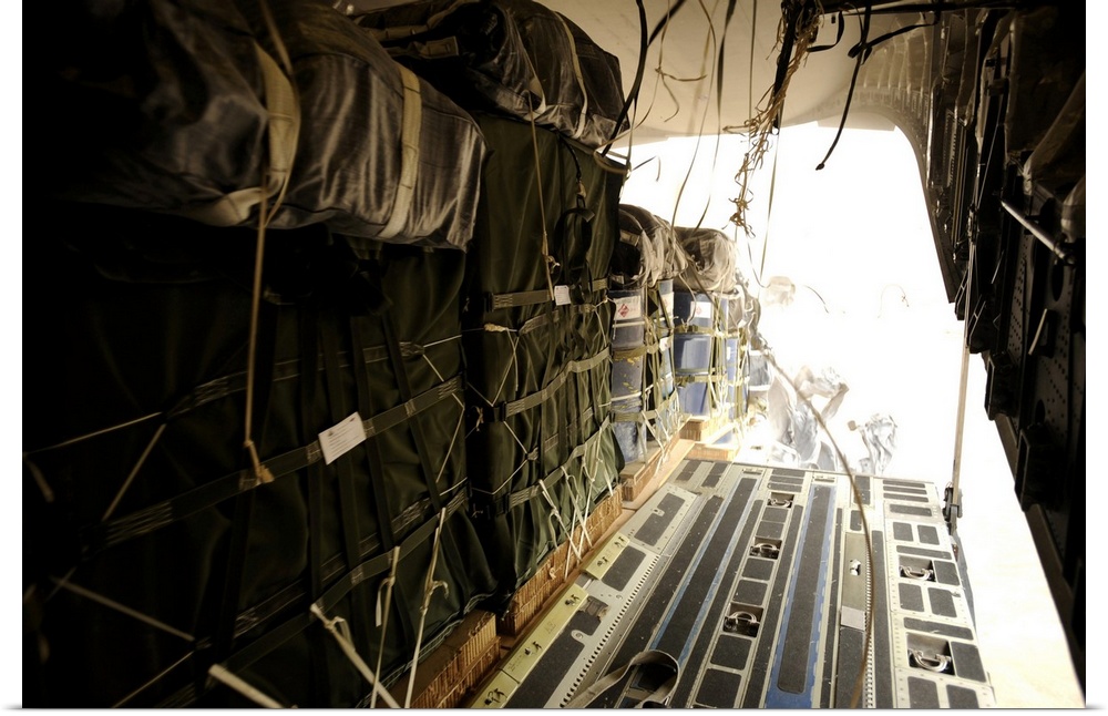 May 9, 2010 - In less than thirty seconds, 40 container delivery system bundles totaling 70,000 pounds drop out of a C-17 ...
