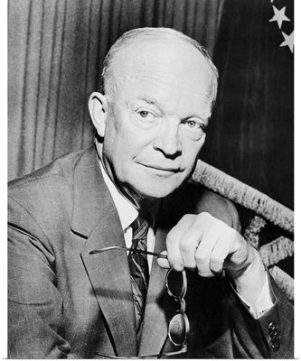 Digitally restored photo of Dwight Eisenhower holding a pair of glasses