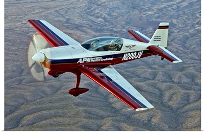 Extra 300 aerobatic aircraft over Mesa, Arizona