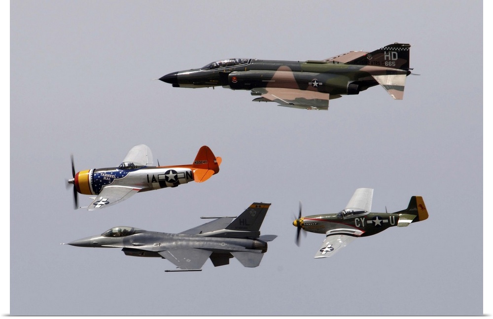 An F-4 Phantom, P-47 Thunderbolt, F-16 Fighting Falcon and P-51 Mustang fly in a heritage flight.