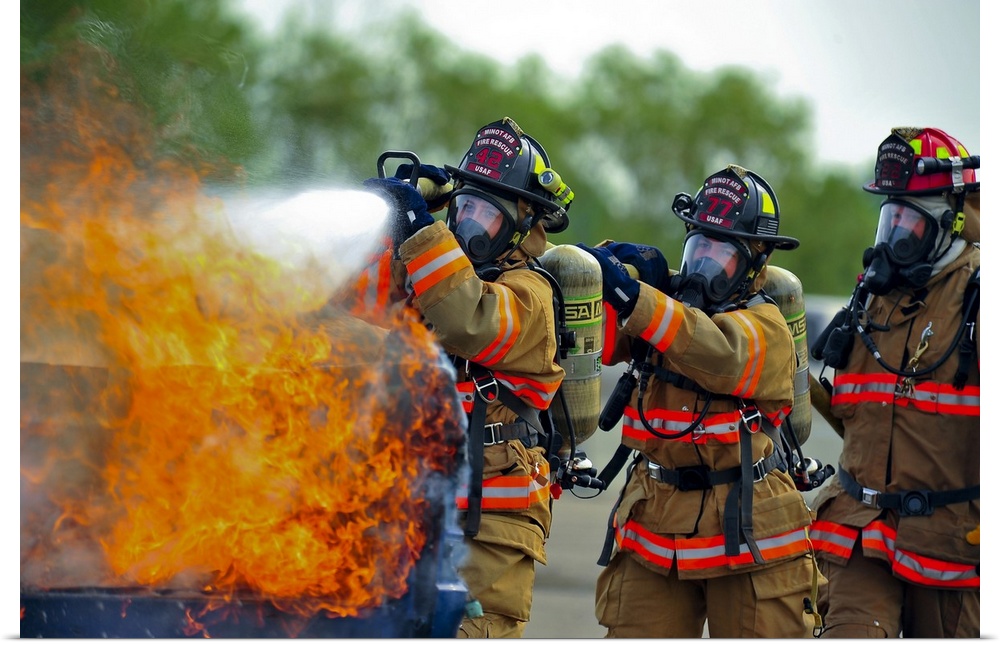 August 5, 2014 - Firefighters put out a fire during an exercise on Minot Air Force Base, North Dakota. The exercise focuse...
