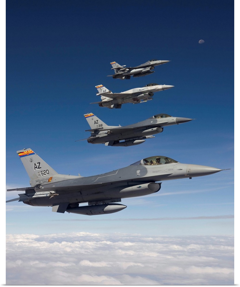 Four F-16's stationed at the 162nd Fighter Wing in Tucson, Arizona, fly in formation during a training mission.