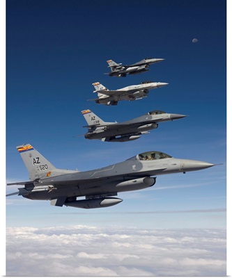 Four F-16s fly in formation during a training mission over Arizona
