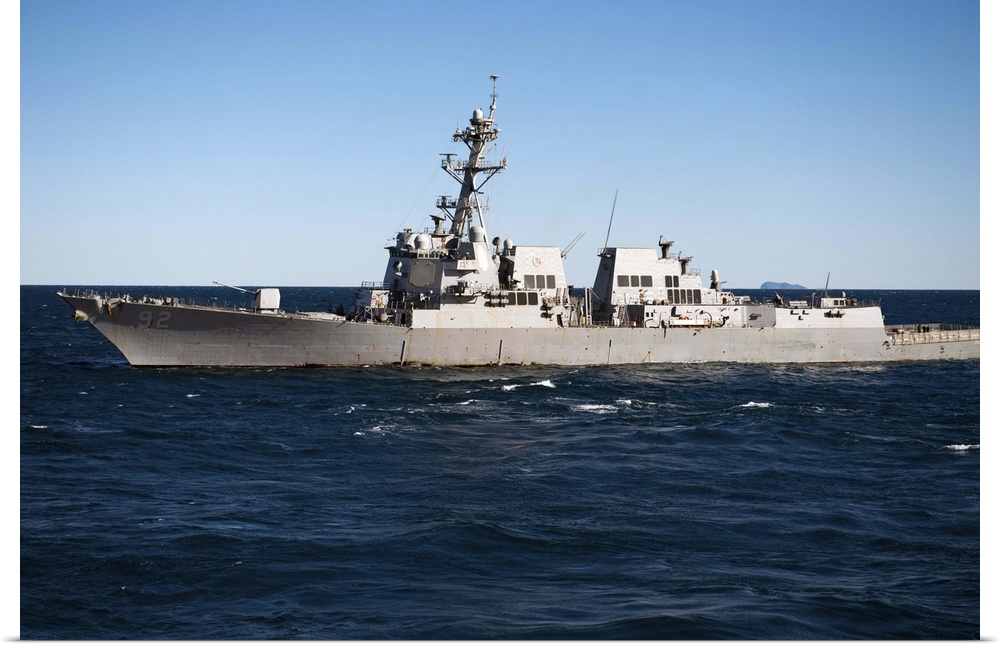 July 24, 2013 - The guided-missile destroyer USS Momsen (DDG-92) transits the Coral Sea during exercise Talisman Saber 2013.