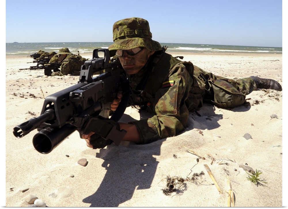 Palanga, Lithuania, June 11, 2012 - Lithuanian special forces members lie in formation on a beach during a Baltic Operatio...