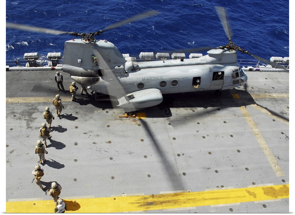 Pacific Ocean, October 21, 2008 -Marines load into a CH-46E Sea Knight helicopter for a fast-rope training exercise onto t...