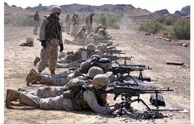 Marines fire their M240G medium machine guns and M249 squad automatic weapons