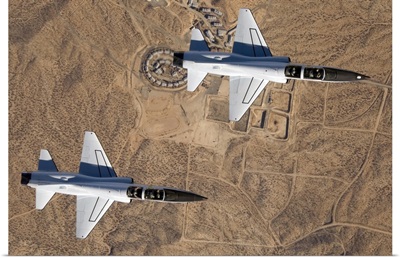 NASA Drydens two T38A mission support aircraft fly in tight formation