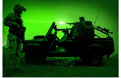 Night vision view of U.S. Special Forces on patrol