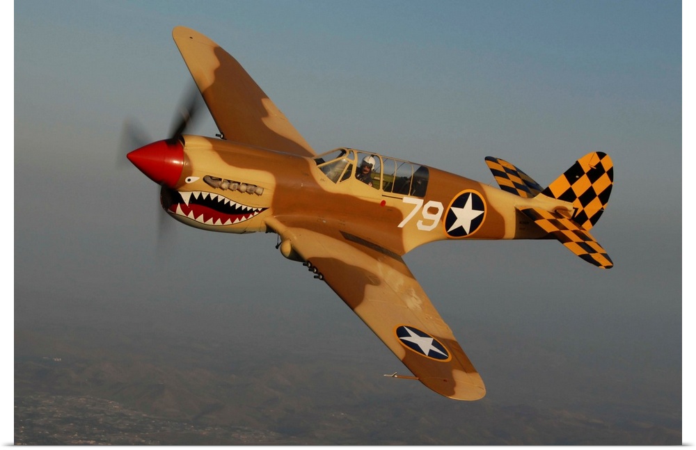 P-40 Warhawk flying over Chino, California.