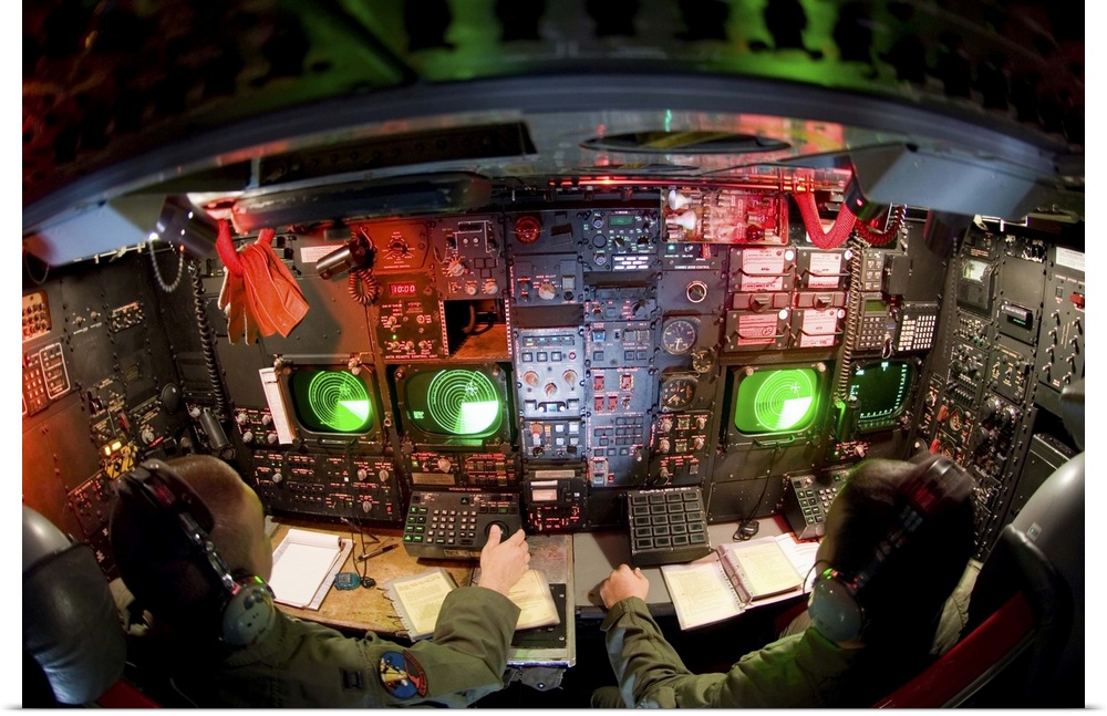 Pilots at the controls of a B-52 Stratofortress.
