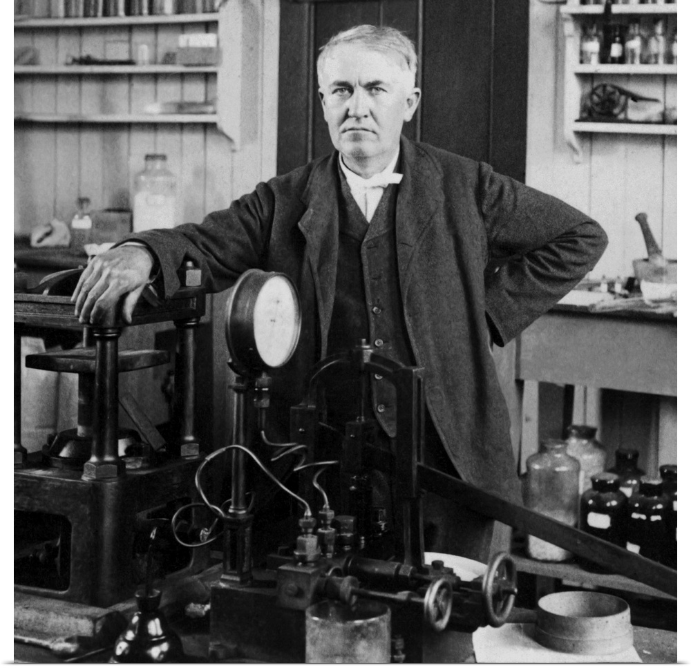 Portrait of American inventor Thomas Edison, posed inside his workshop, dated 1901.