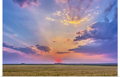 Prairie sunset with crepuscular rays in Alberta, Canada