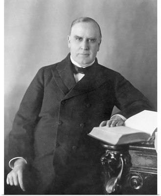 President William McKinley seated at desk, circa 1900