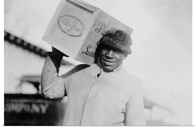 Prohibition Era Photograph Of A Man Carrying A Case Of Whiskey